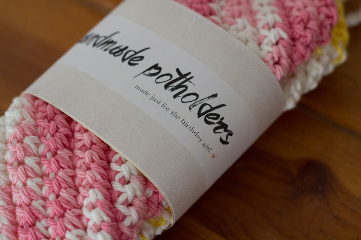 handmade label on crocheted potholders
